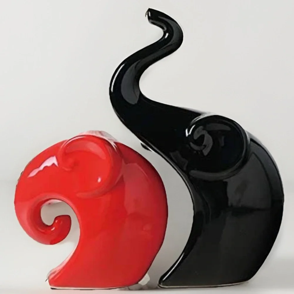 Elegant Black and Red Elephant Sculptures - Picture 6 of 11